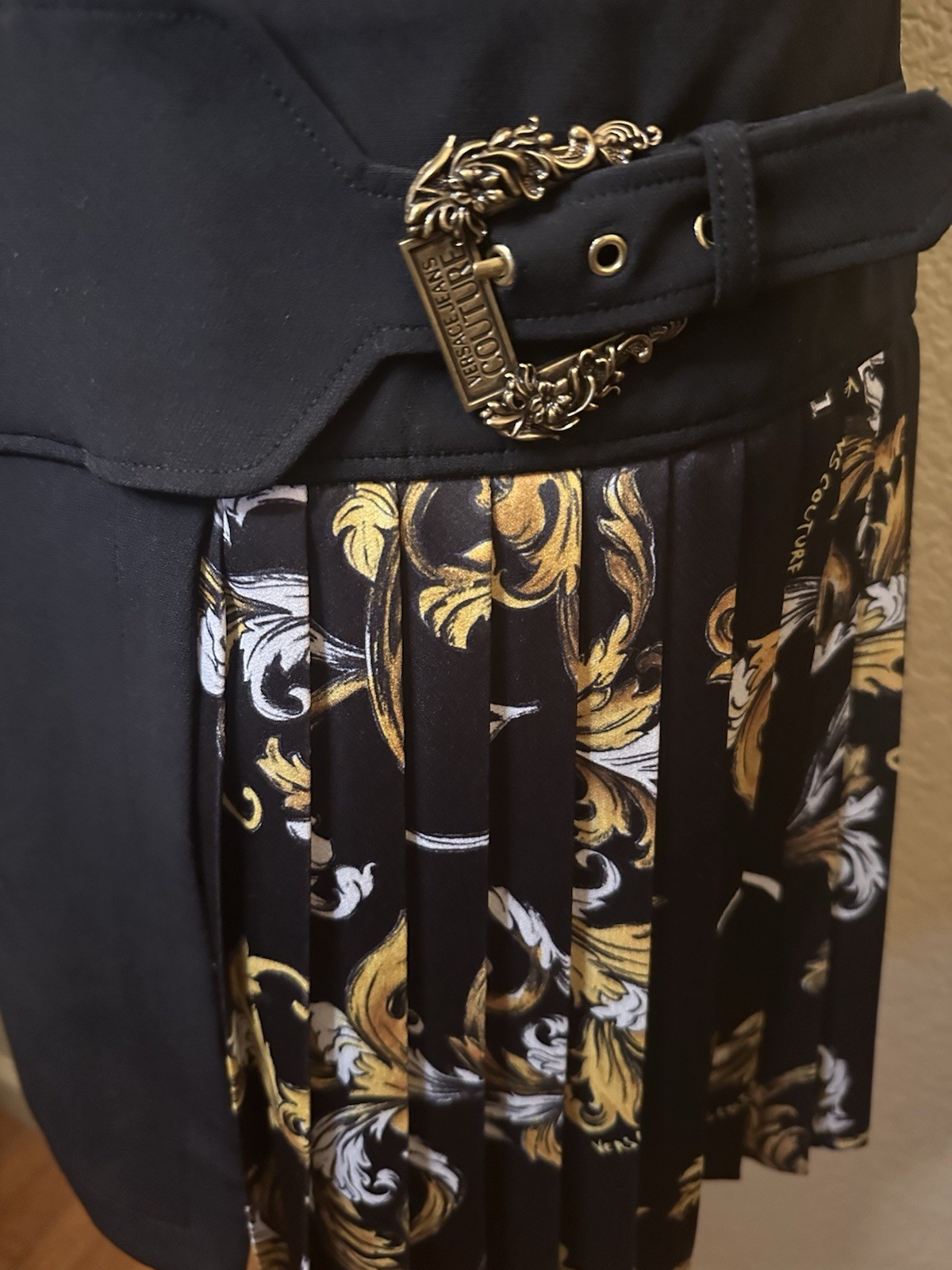 Black Asymmetrical Skirt with Floral Pleated Panel and Buckle Accent