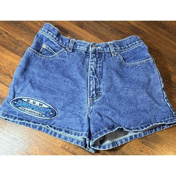 Vintage 1990s BUM equipment denim shorts with large logo patches. SZ 7 waist 28