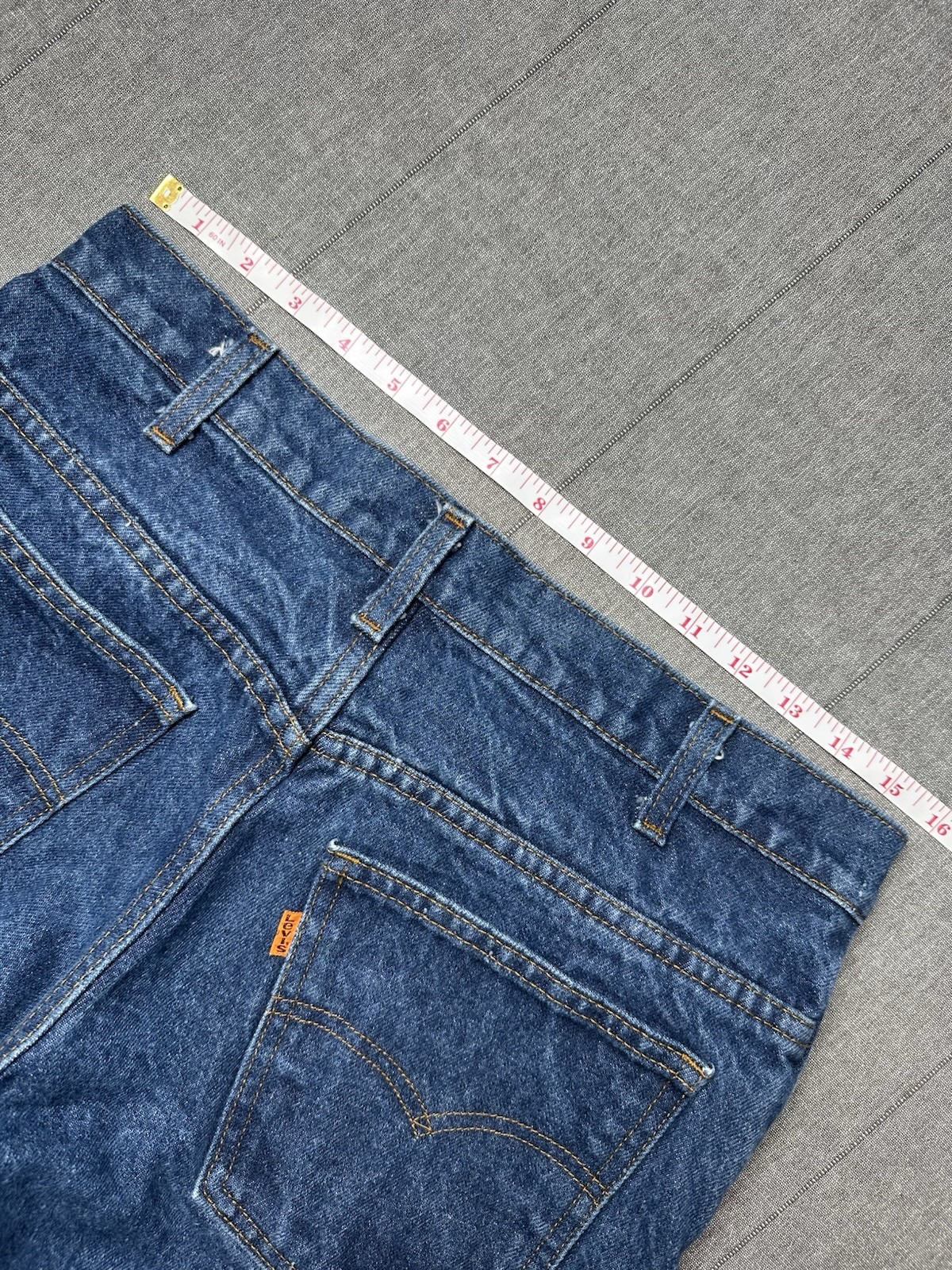 Vintage 1980s Orange Tab Bell Bottom Levis Women’s 32×28