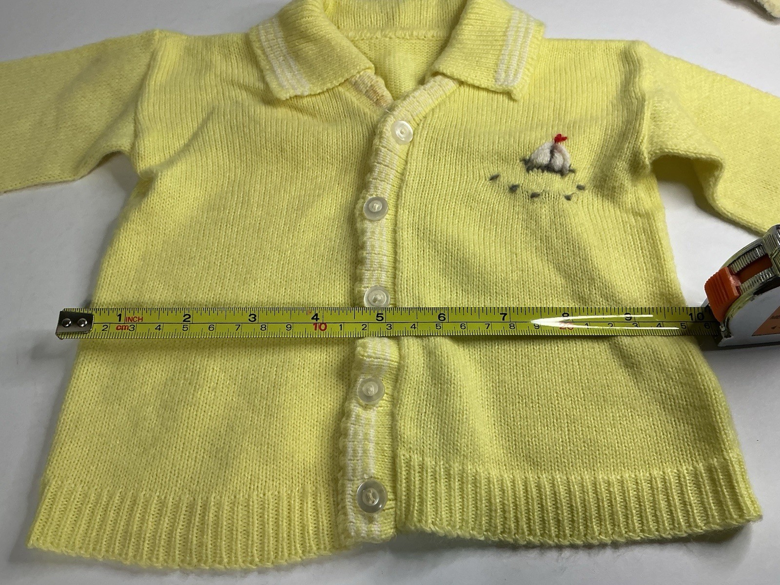 Vintage 1950s Santone romper, sailboat knit, and classic cardigans