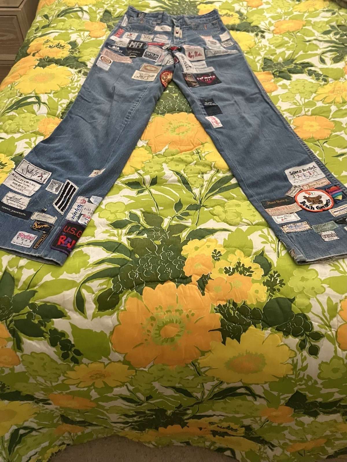 Vintage 1970’s Women’s Chemin De Fer blue jeans with patches.