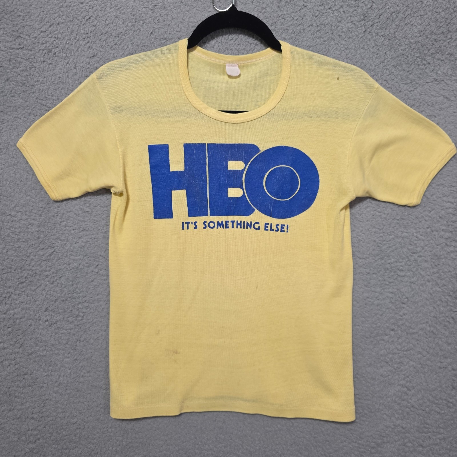 Vintage Ringer T-Shirt HBO It’s Something Else Yellow 80’s Small/ Medium?