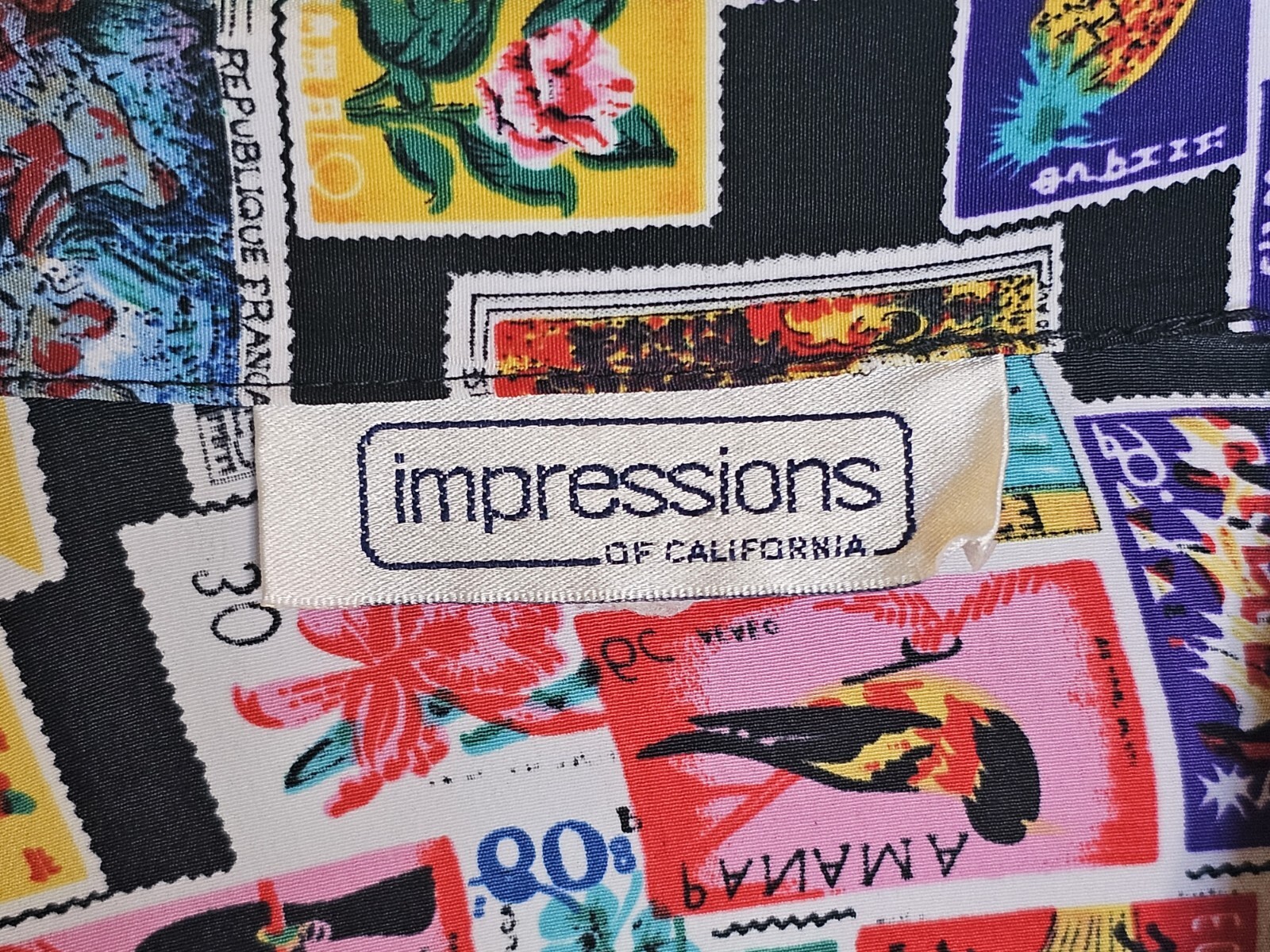 Women’s Impressions of California blouse International Stamps Print