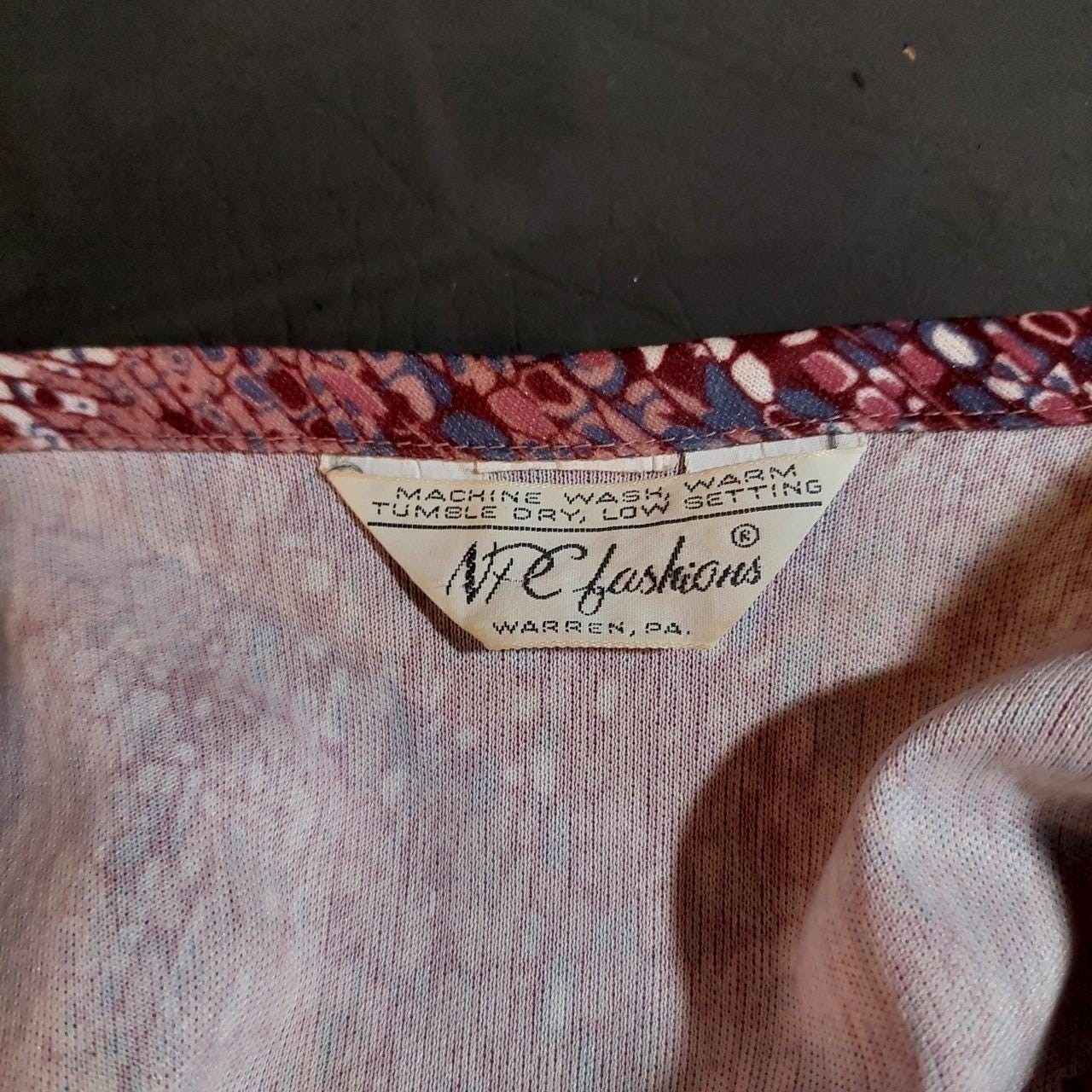 Vintage purple patterned long sleeve top.
