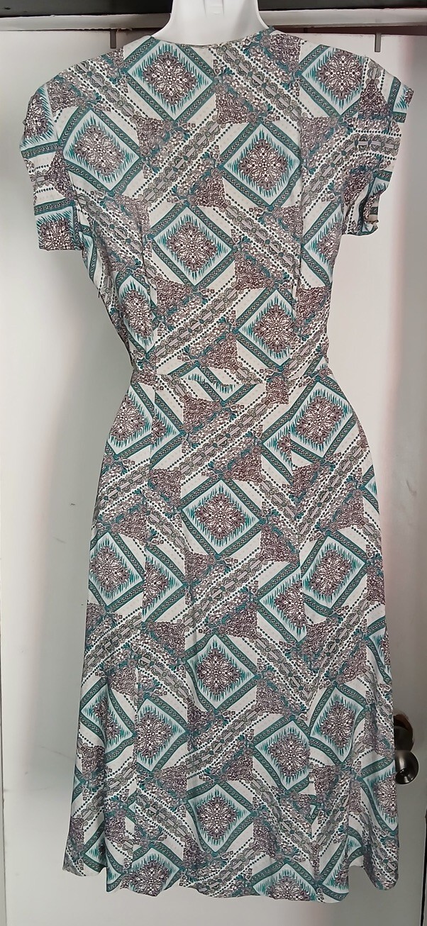 Unique & Flattering 40s handmade Rayon dress with cute tie around neck.Must See!