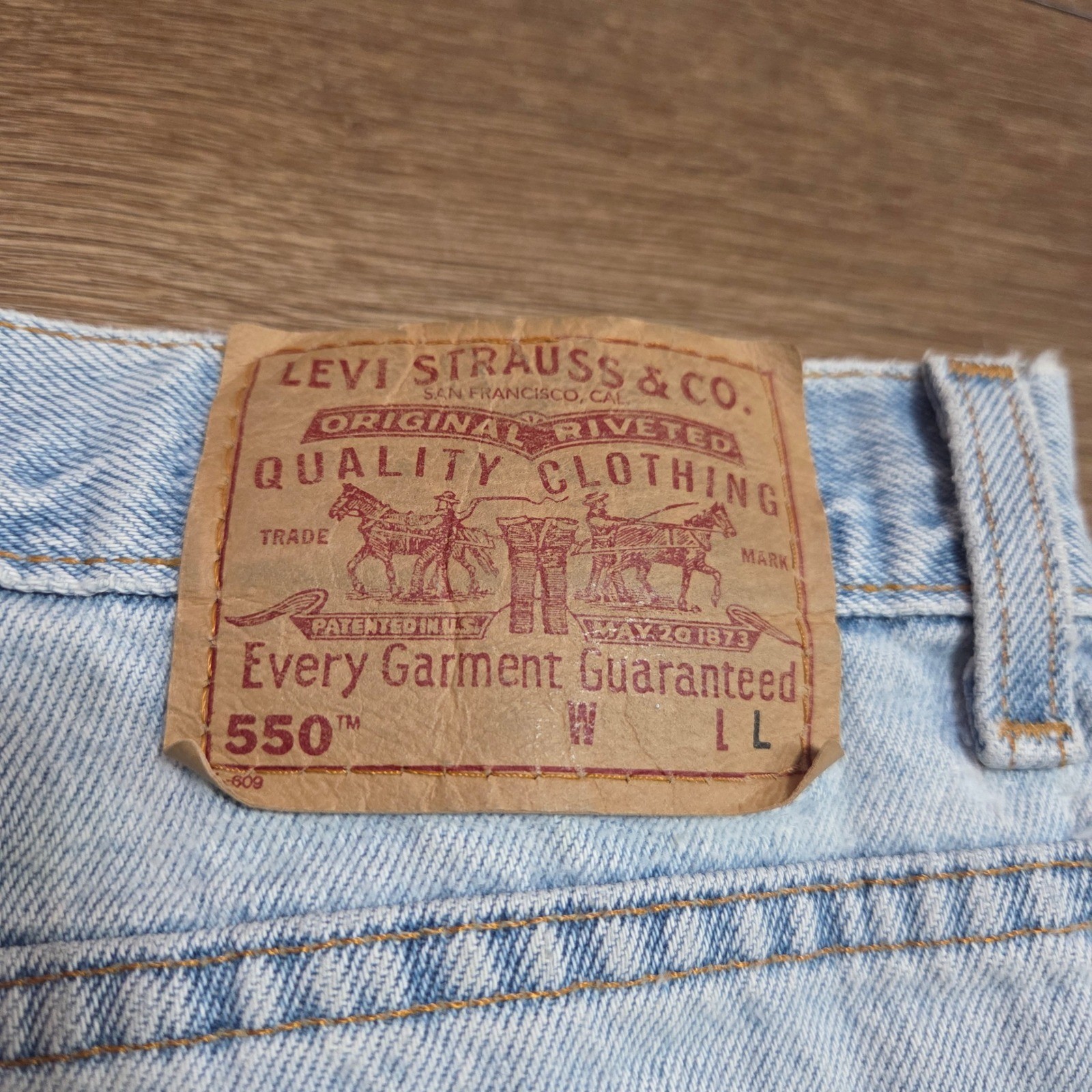 Vintage y2k Levis 550 Relaxed Fit Tapered Leg Jeans Light Wash Made in USA 16L