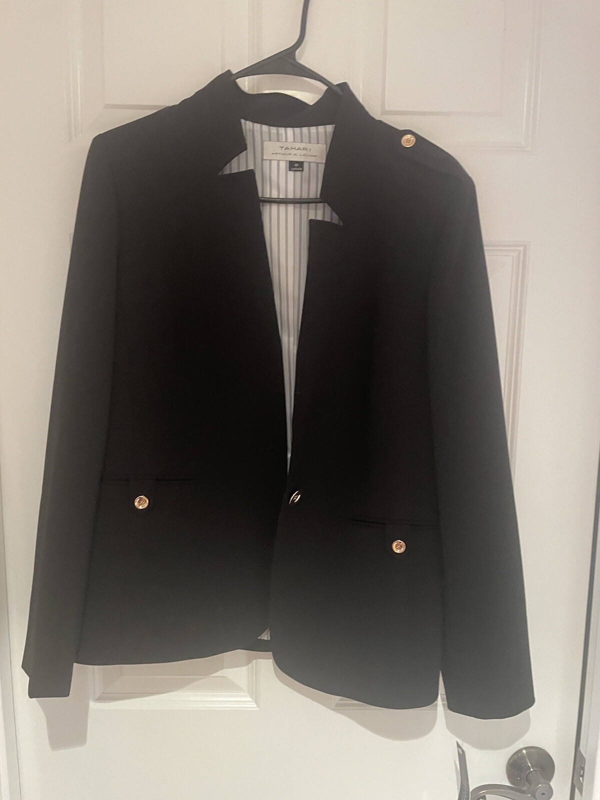 Tahari Arthur S. Levine 2 piece garment, blazer and pants. Size 10. Color black.
