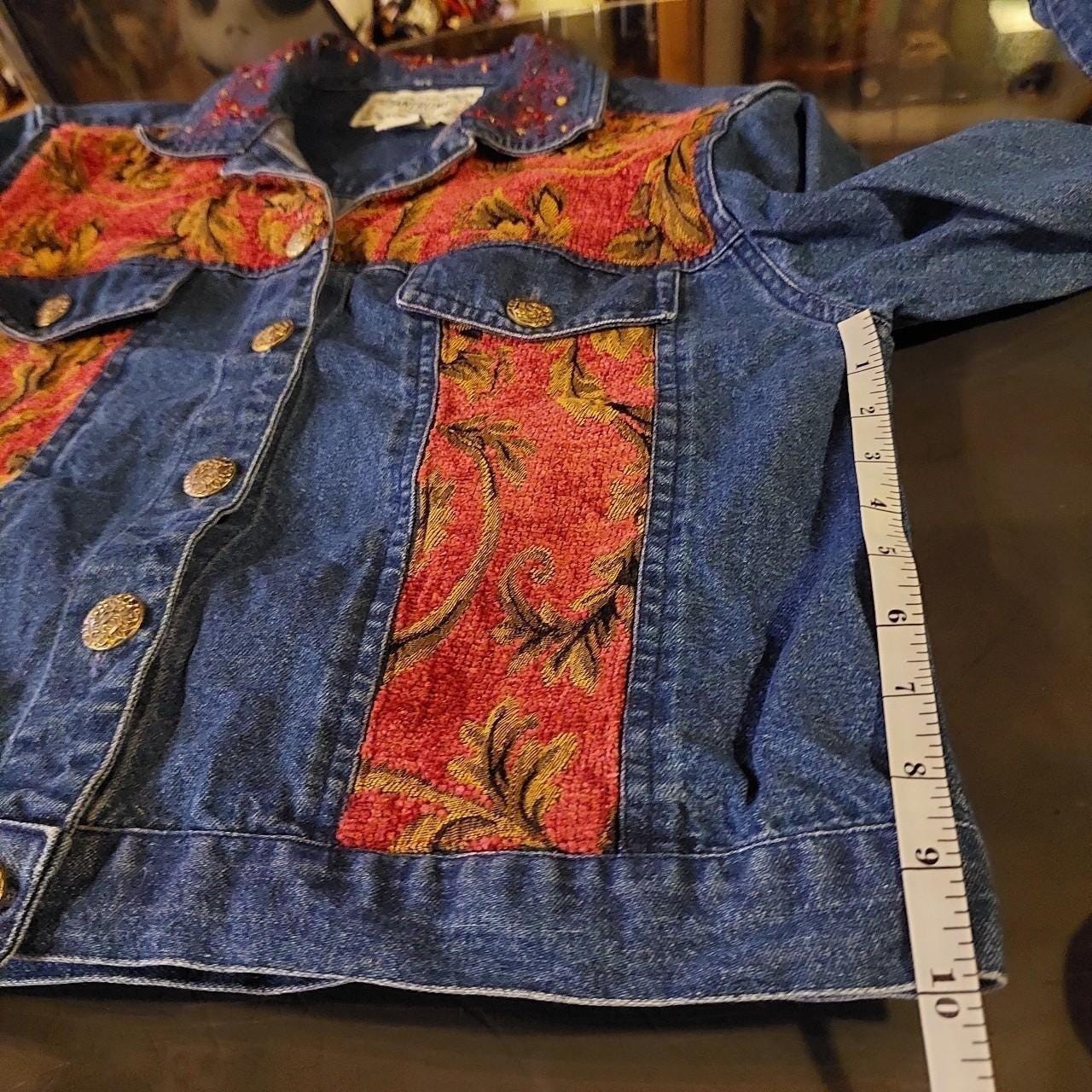 Vintage embellished jacket with gold buttons.