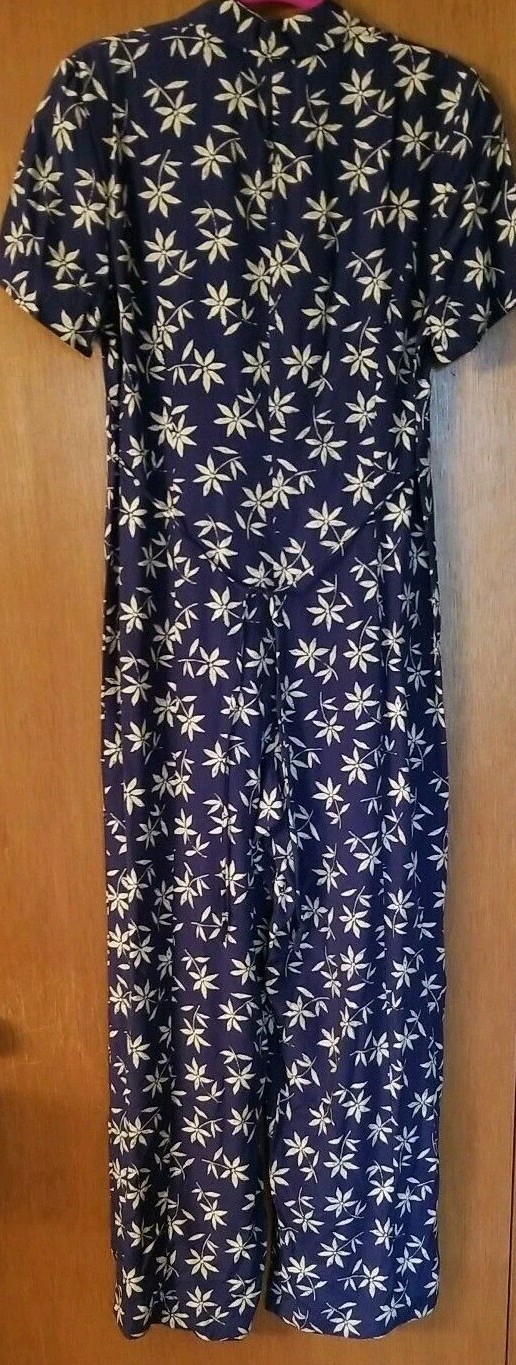 Vtg. ED Michaels Women’s Blue Floral Jumpsuit Size 6. NWOT.