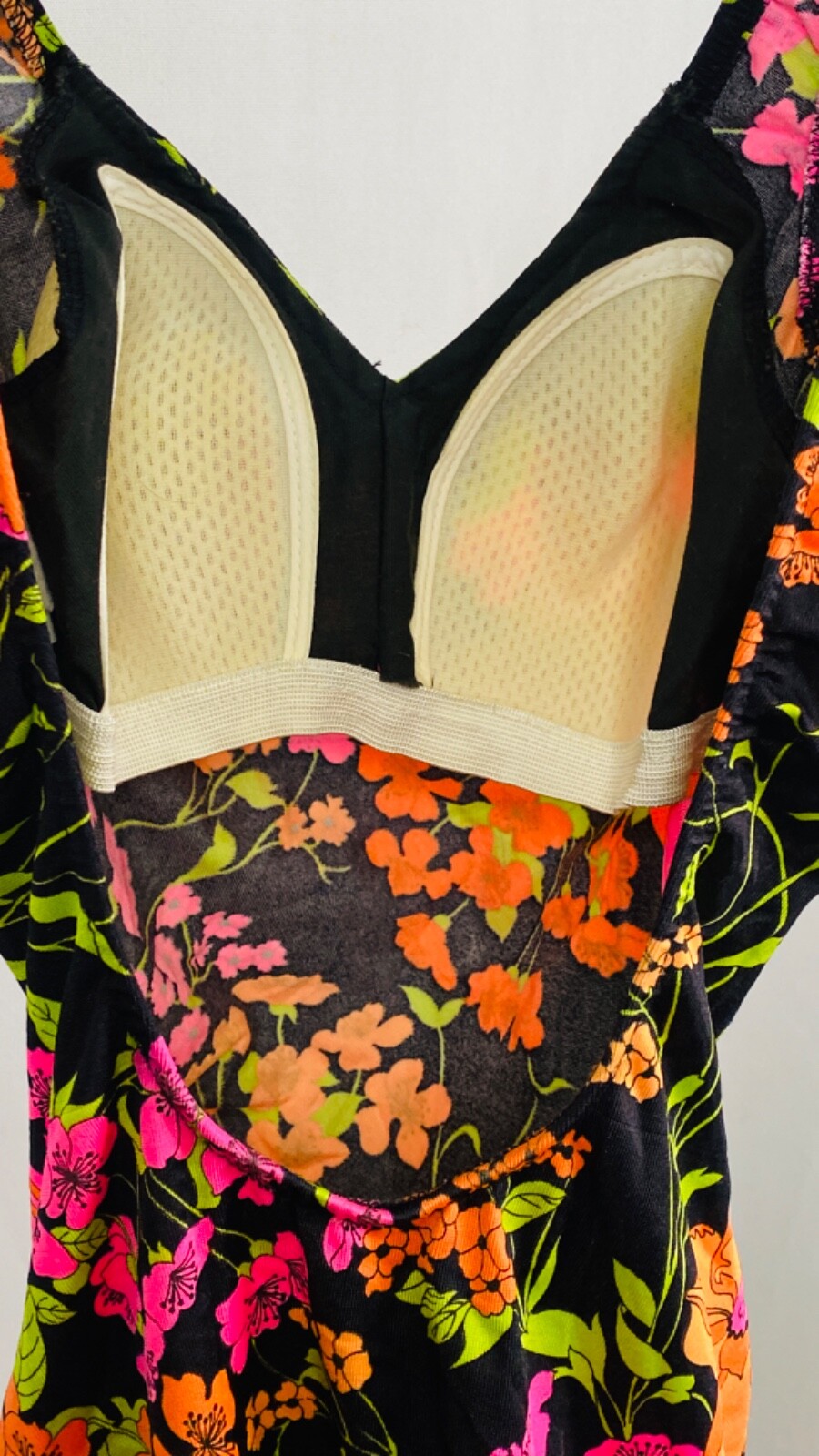 Vintage 1970s colorful floral swimsuit, pink skirted one-piece black pin up XS
