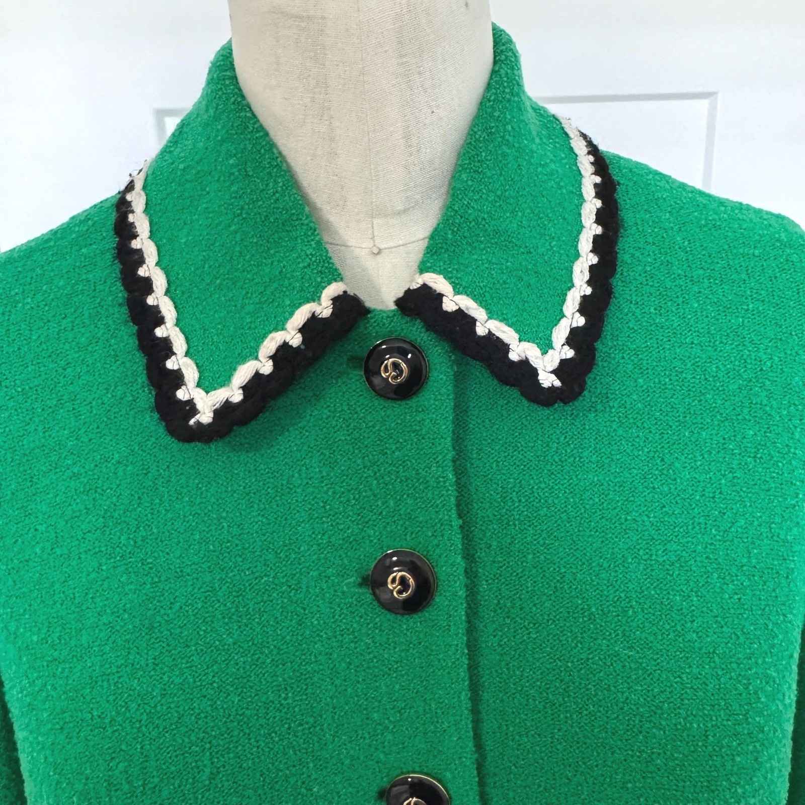 Vintage St John green Santana knit blazer with black and white knit trim