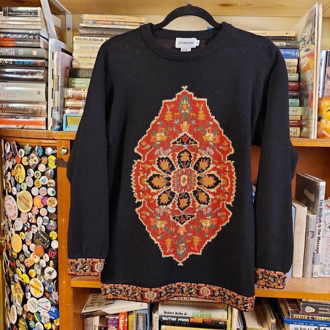 Vintage 100% wool black sweater with button detail.