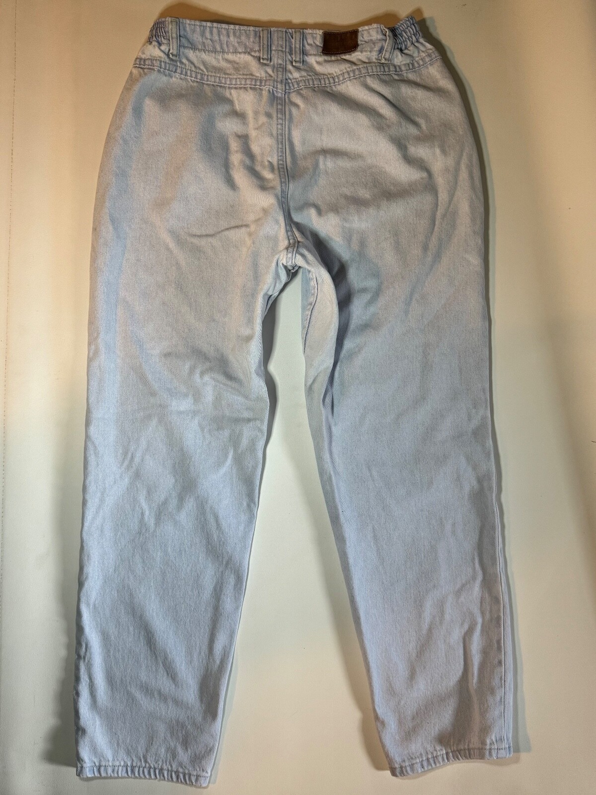 Vintage 1990’s Lee light wash denim jeans, elastic band on each side, 27″ Inseam