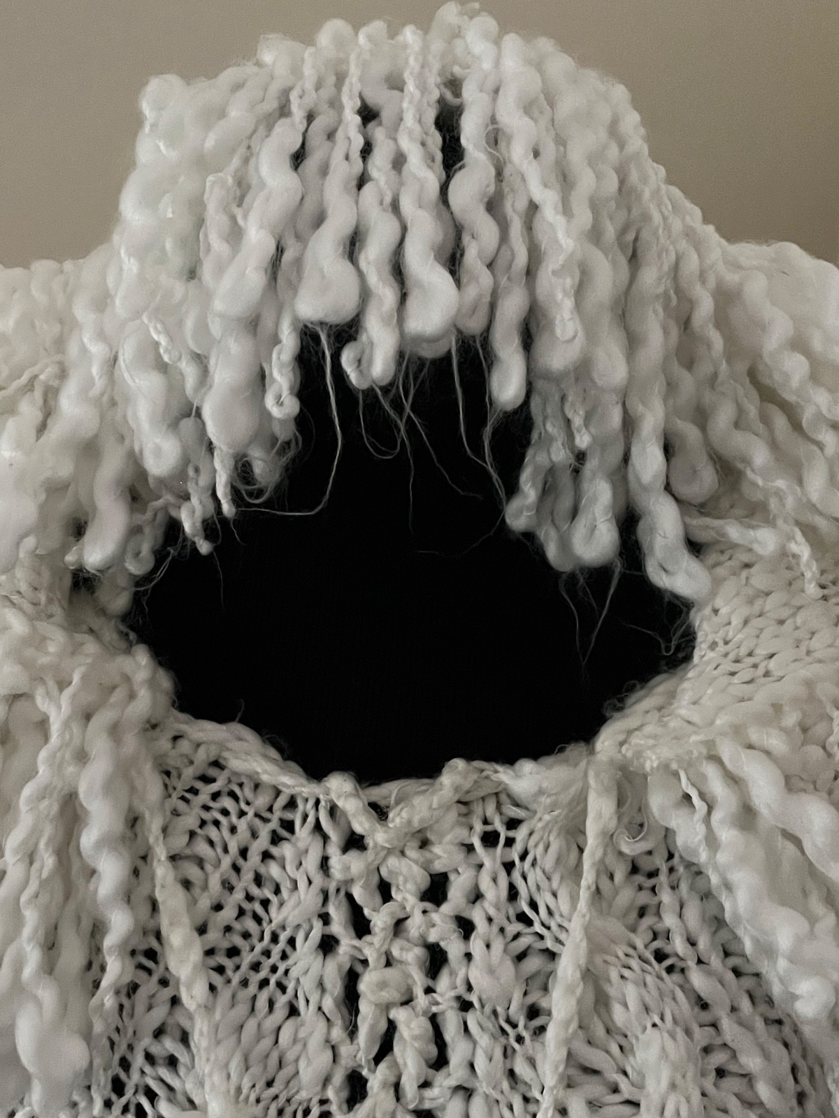 Adorable vintage white knit poncho with hood, fringe and pom poms