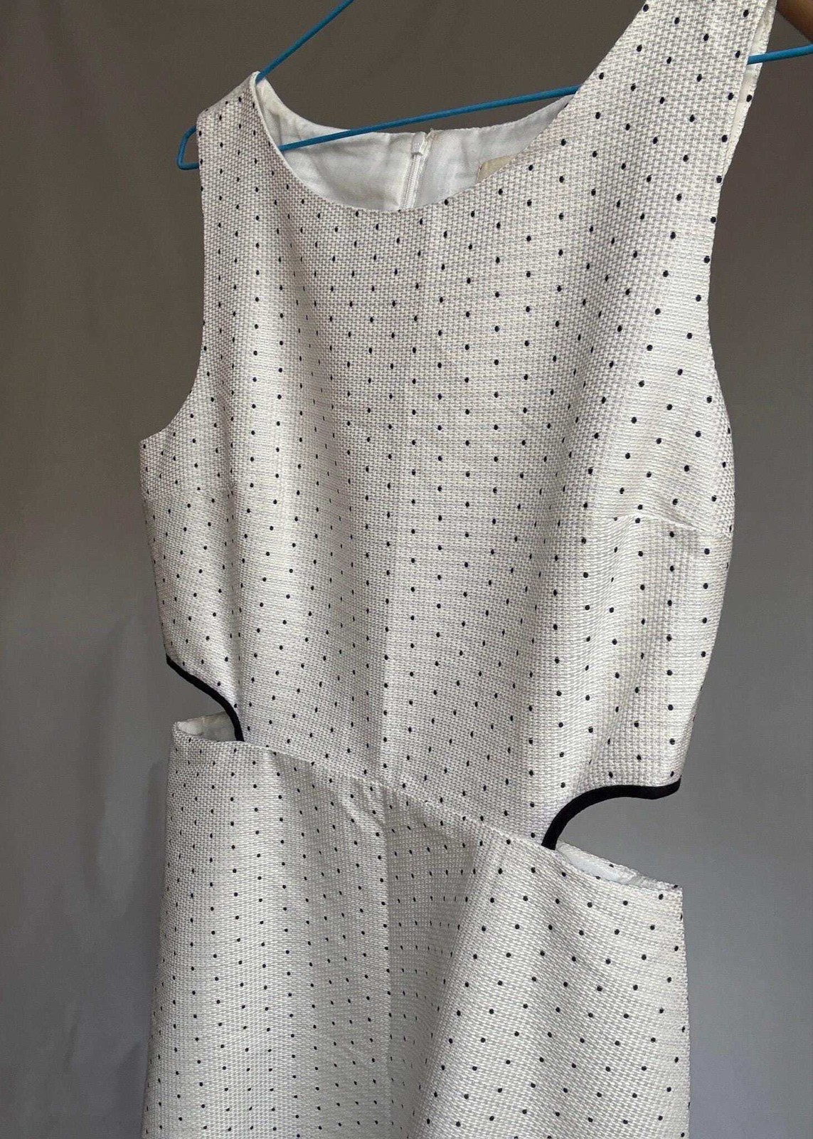 Cotton mini dress with side cutouts, Size US M, White outfit with navy dots