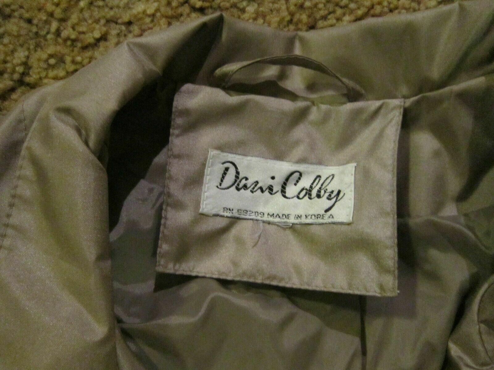 Dani Colby Silver Coat with shoulder padding