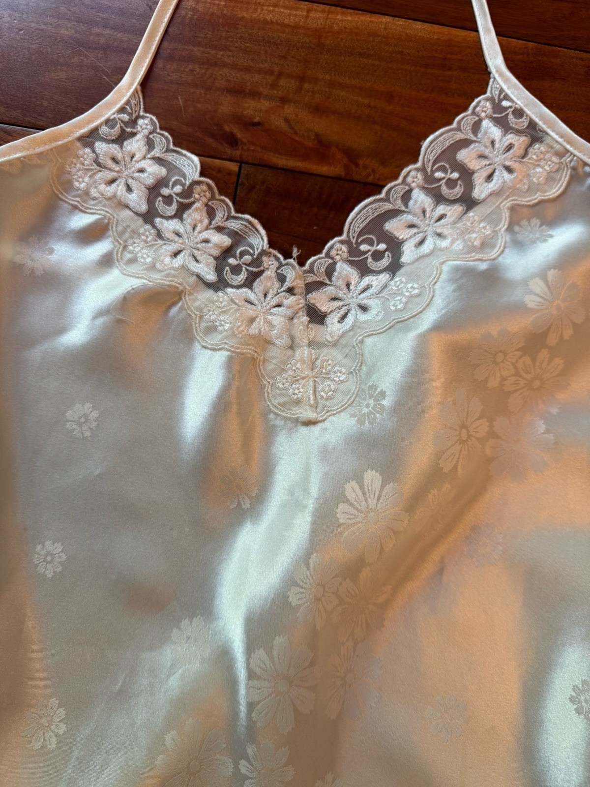 Lacy White Slip With Bow And Flower Details. Looks Like Size Large