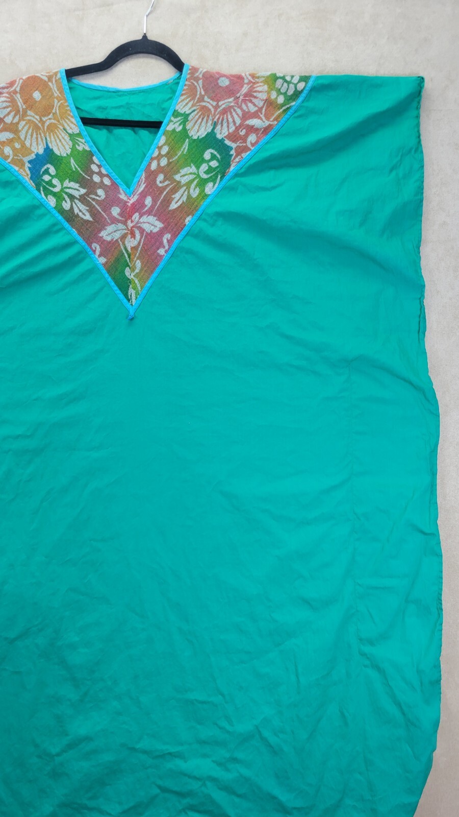 Vintage Womens Teal Muumuu With A Multi Colored Cheese Cloth Vneck Design