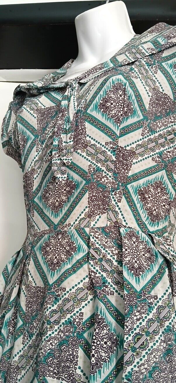 Unique & Flattering 40s handmade Rayon dress with cute tie around neck.Must See!