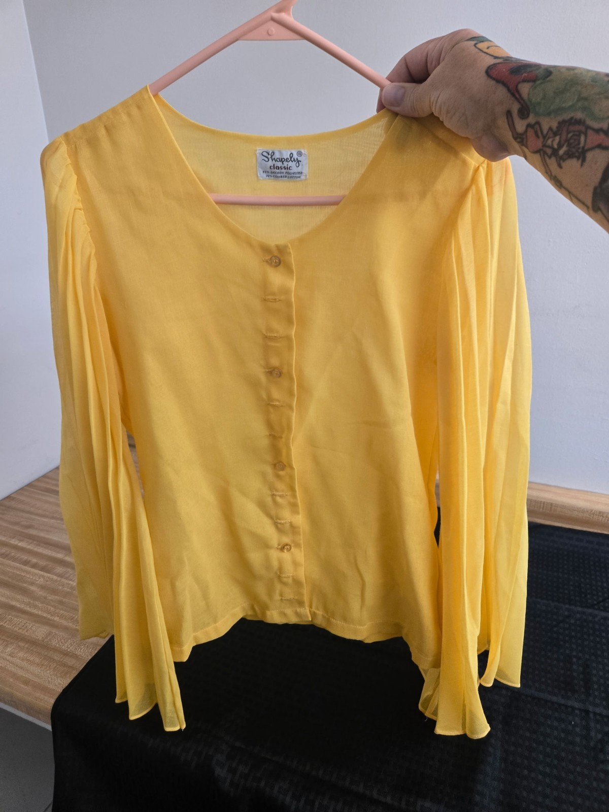 Vtg. Shapely Classic 1970s top; yellow dacron/cotton, pleated sleeves.