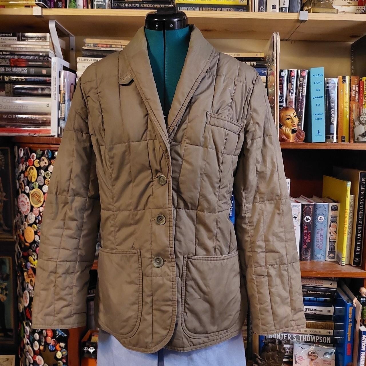 Vintage green down quilted jacket.