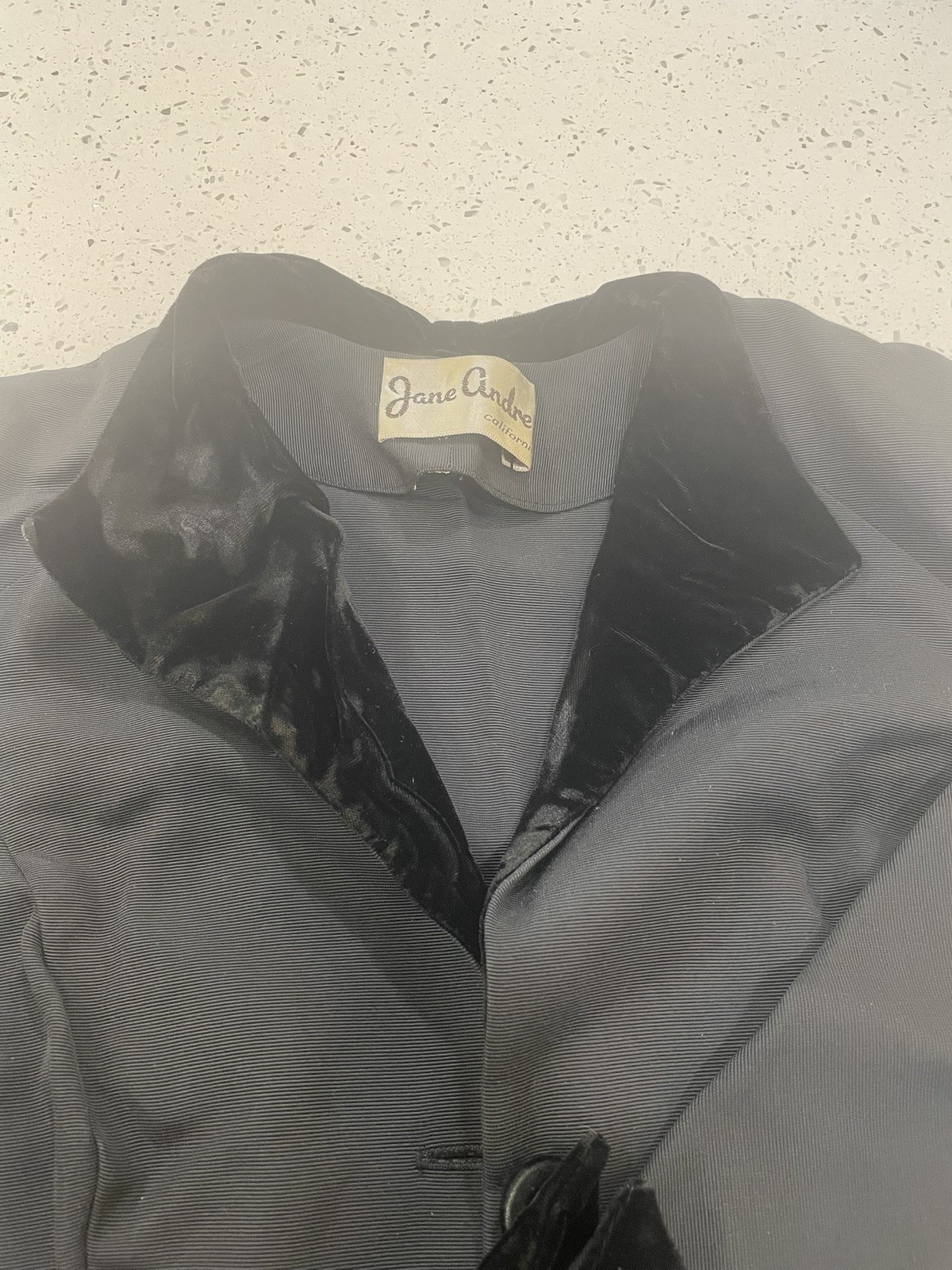Vintage Jane Andre California jacket with skirt. Black with velvet trim.