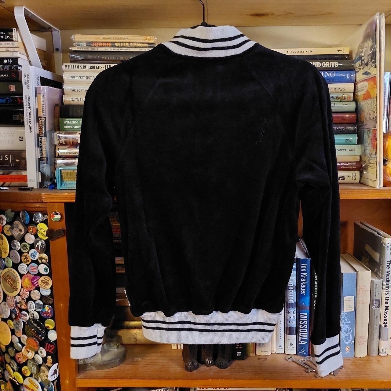 Vintage black and grey velour track suit.
