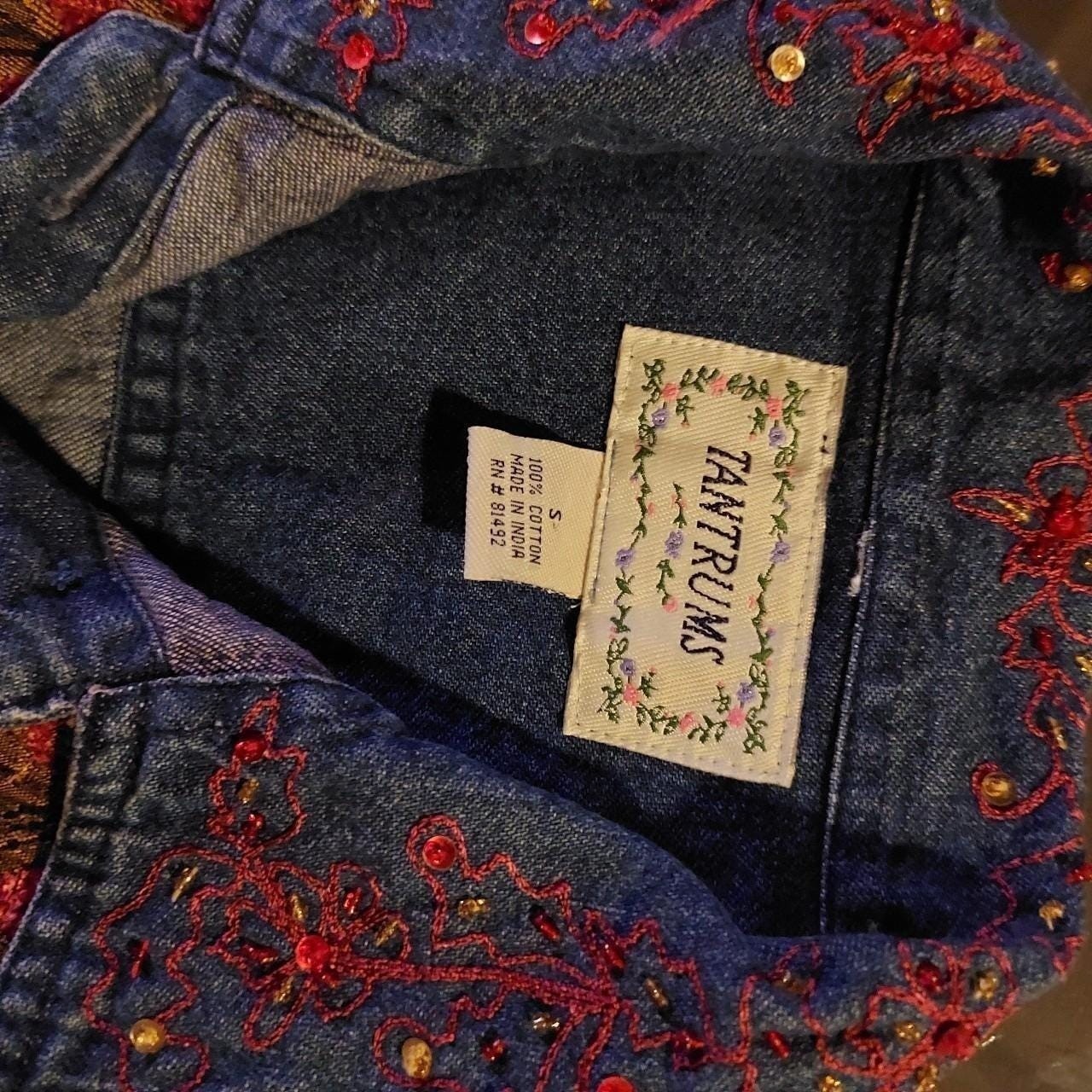 Vintage embellished jacket with gold buttons.