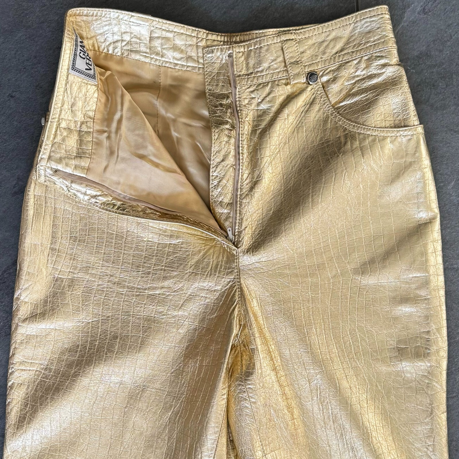GIANNI VERSACE metallic gold leather pants size IT 40/42 from F/W 1994/95