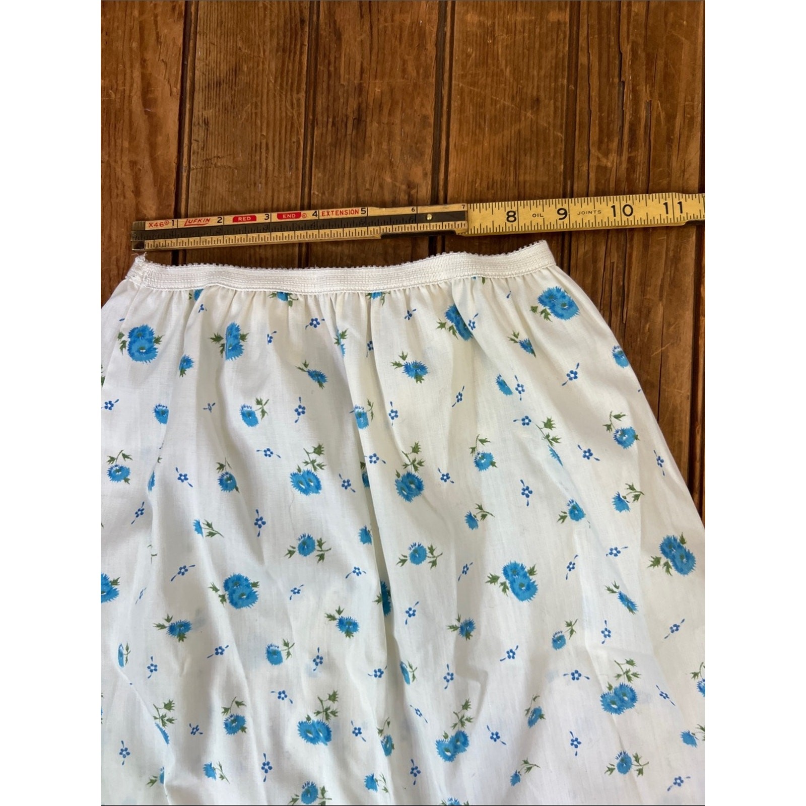 Vintage 1960s mini slip skirt. Off white blue floral scallop edging EUC