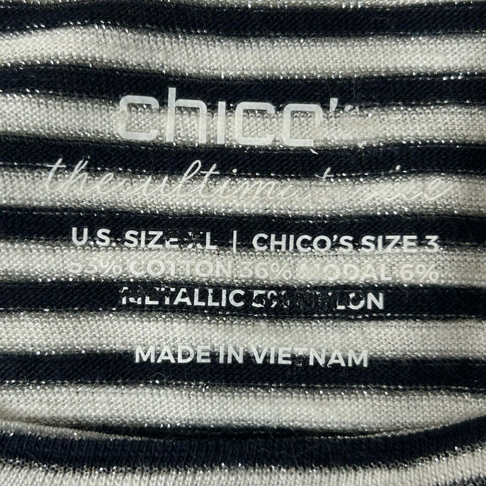 Chico’s women Black and White Striped Top with Metallic Accents.cotton modal .