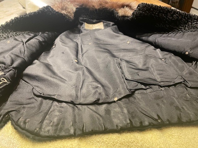 Vintage black Pershing jacket with raccoon fur collar, size medium, fully lined,