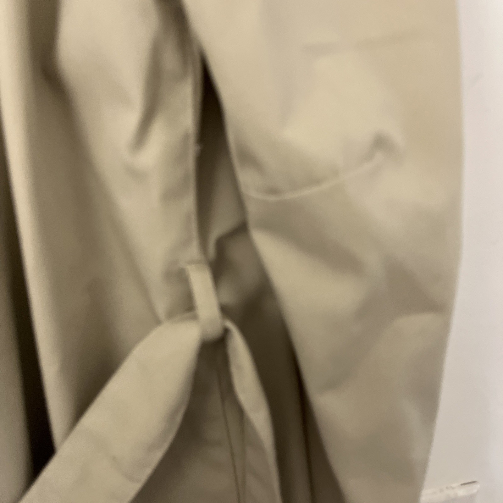 Vintage Woman’s Trench Coat belted Light weight. Very Nice Soft Fabric
