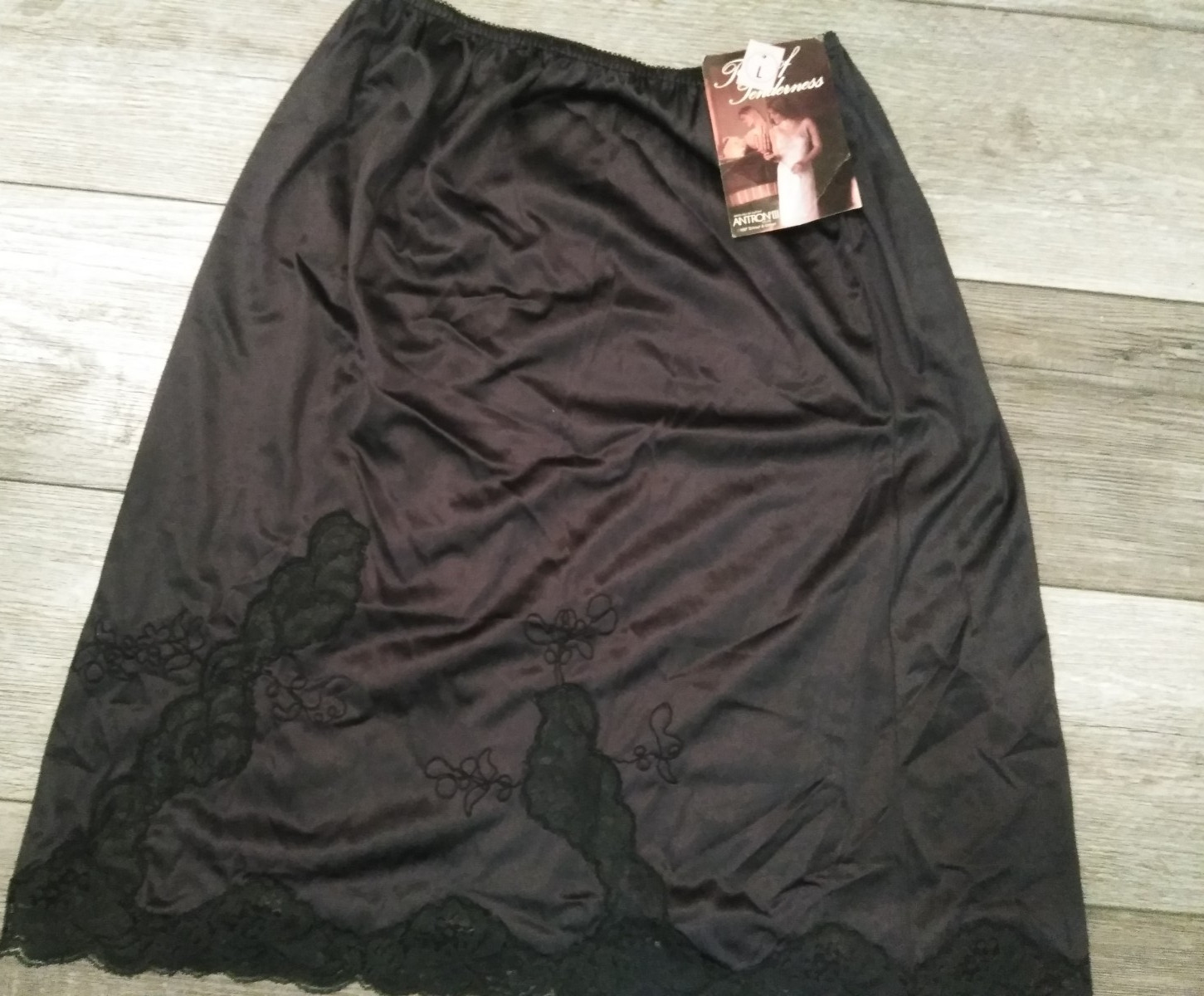 VTG. 1987 TOUCH OF TENDERNESS SIZE LARGE HALF SLIP EMBROIDERED BLACK (N.O.S.)