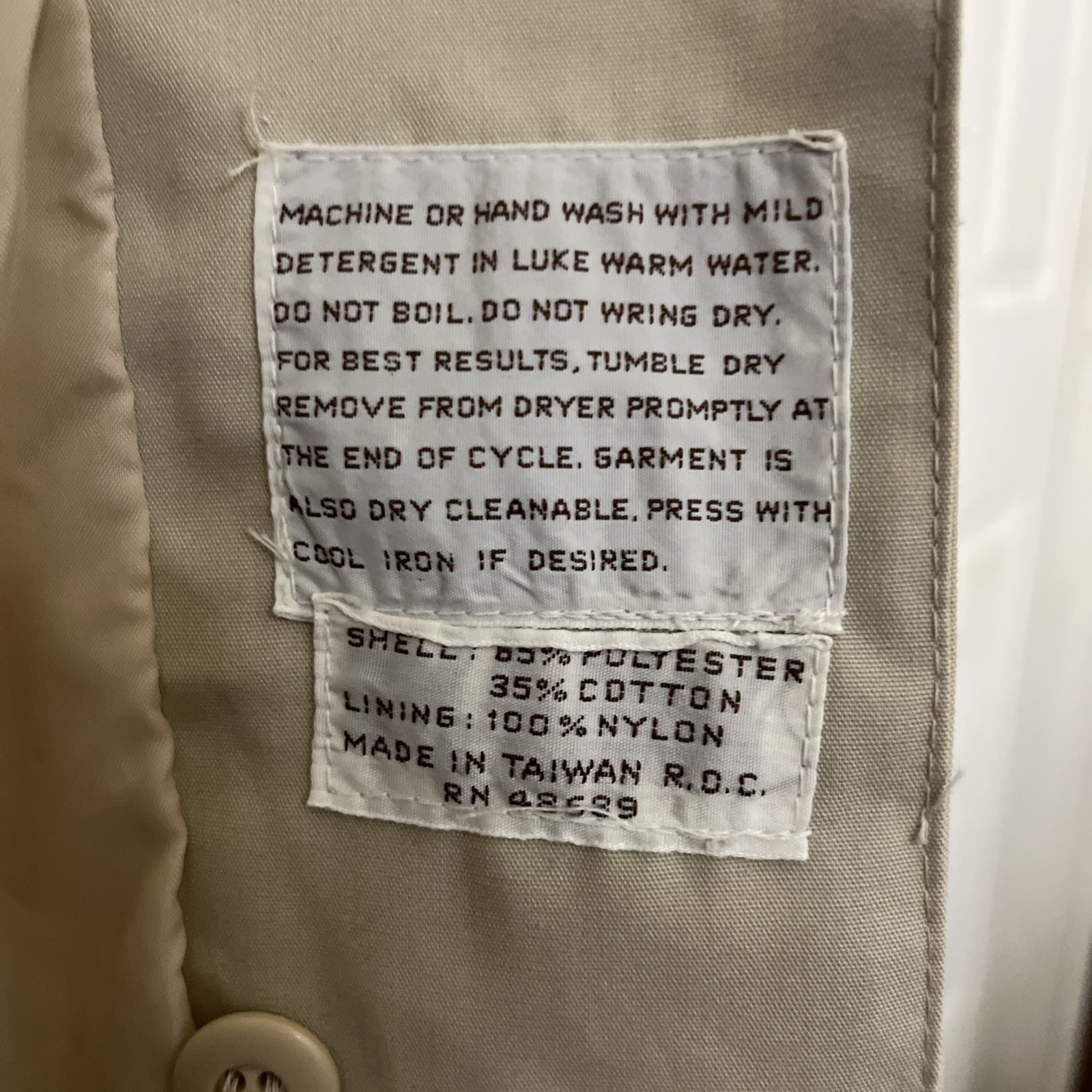 Vintage Woman’s Trench Coat belted Light weight. Very Nice Soft Fabric