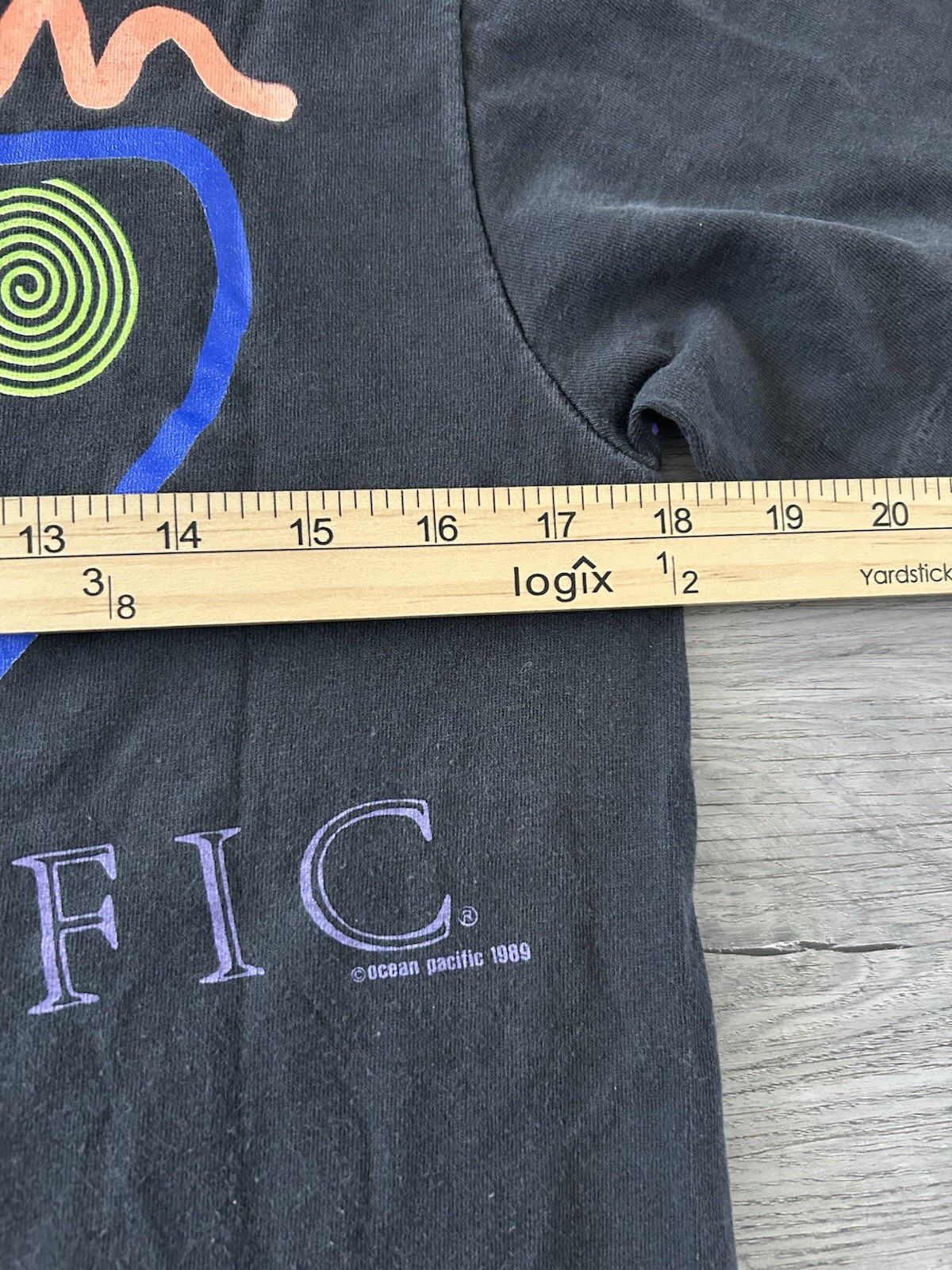 Vintage 90s Ocean Pacific AOP black graphic tee with purple accents USA Made