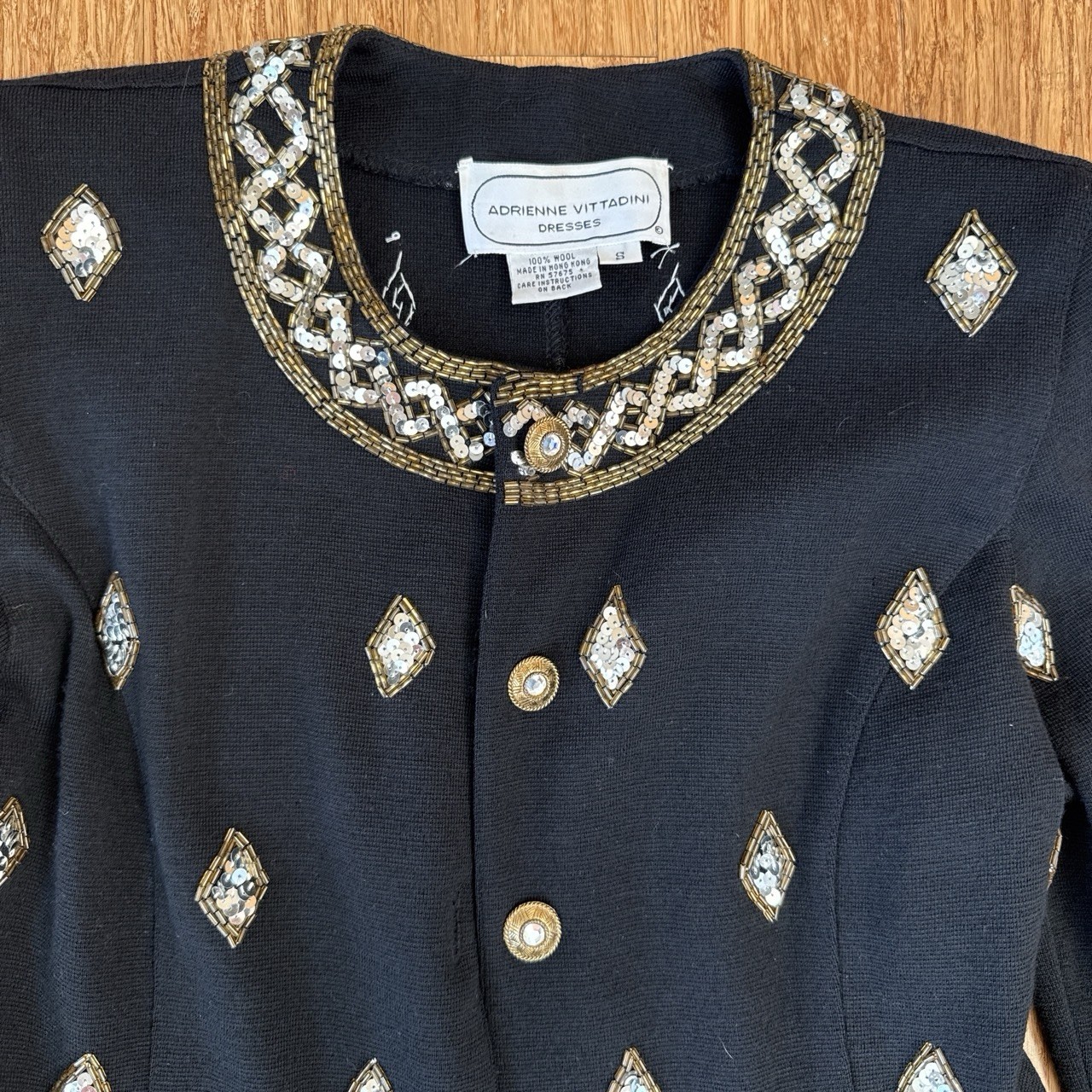 VNTG 1980s Adrianne Vittadini BLK blazer with sliver and gold embellishments.