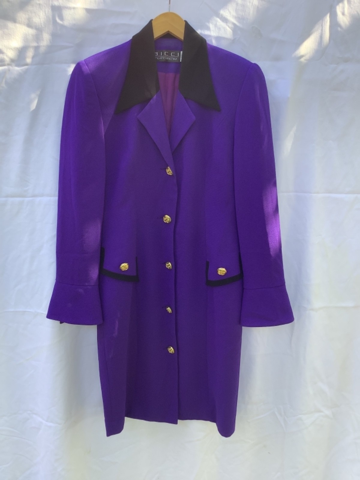 1980s office culture Bicci Florine Wachter deep purple dress