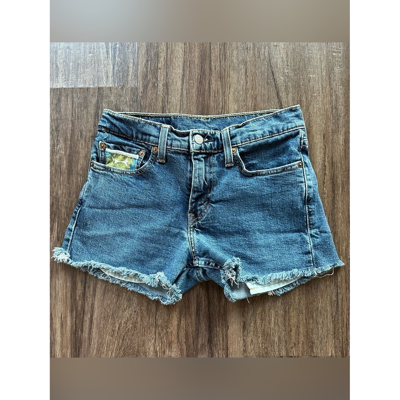Upcycled Levi’s 511 Cut Off Shorts with Embroidered Pockets. Size 28; Runs Small