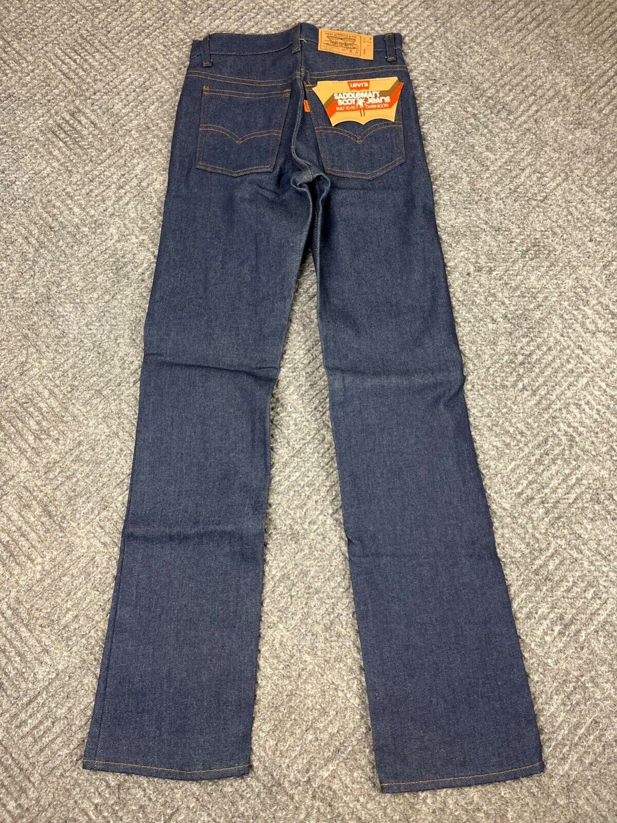 Vintage 80’s Levi’s 716 Saddleman Student Jeans 28×33 Dark Wash Bootcut NOS