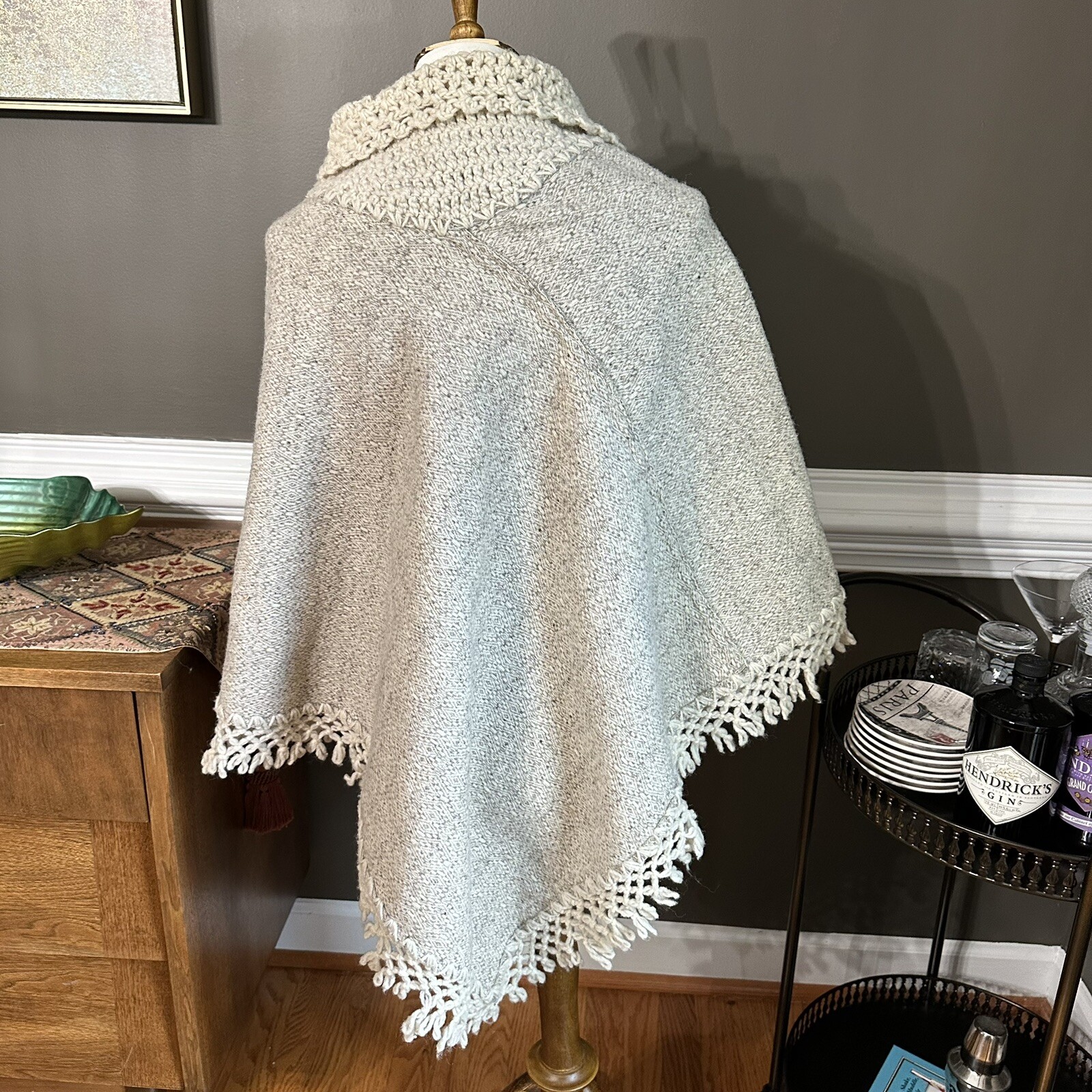 Vintage 1970s Soft and warm cream poncho with hood, tassels, and pom poms