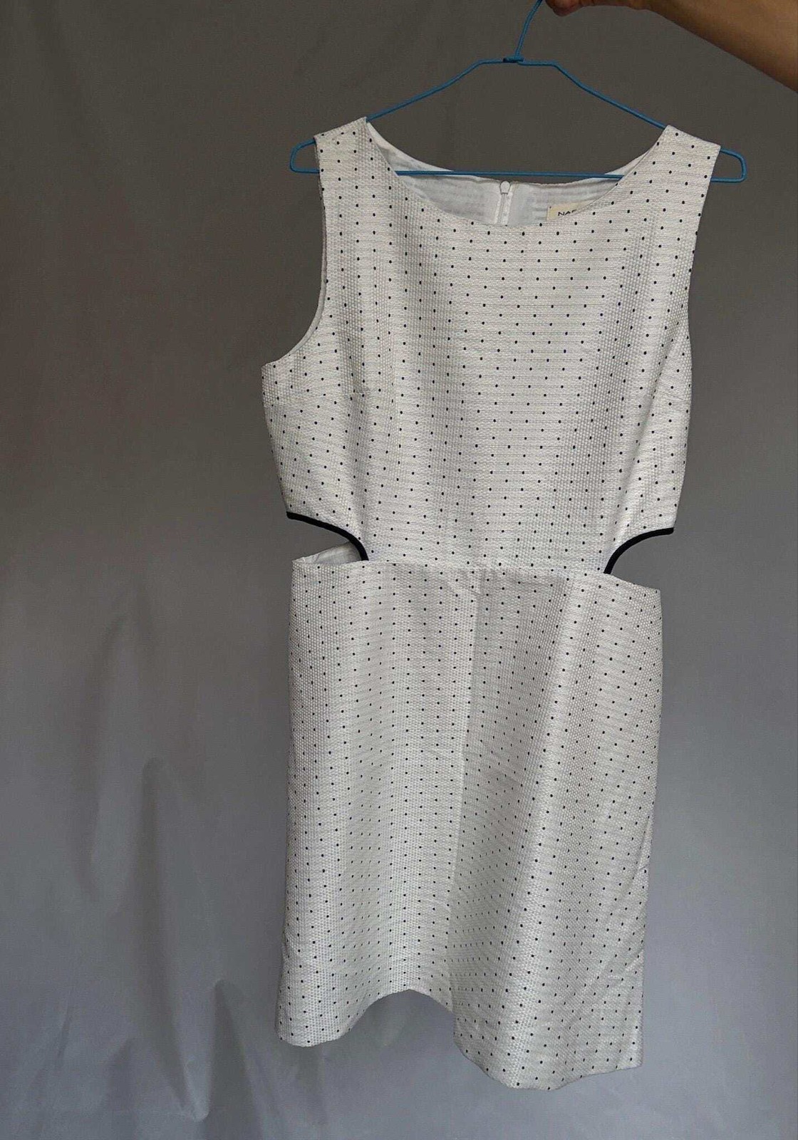 Cotton mini dress with side cutouts, Size US M, White outfit with navy dots