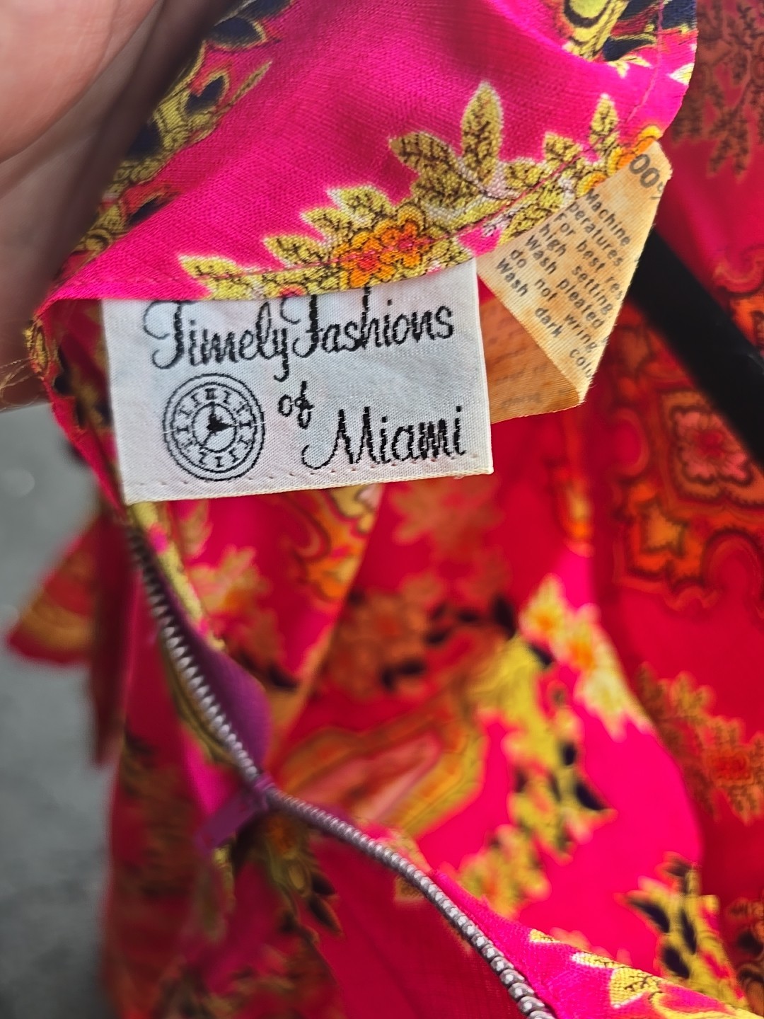 This vibrant piece is from the vintage brand Timely Fashions of Miami