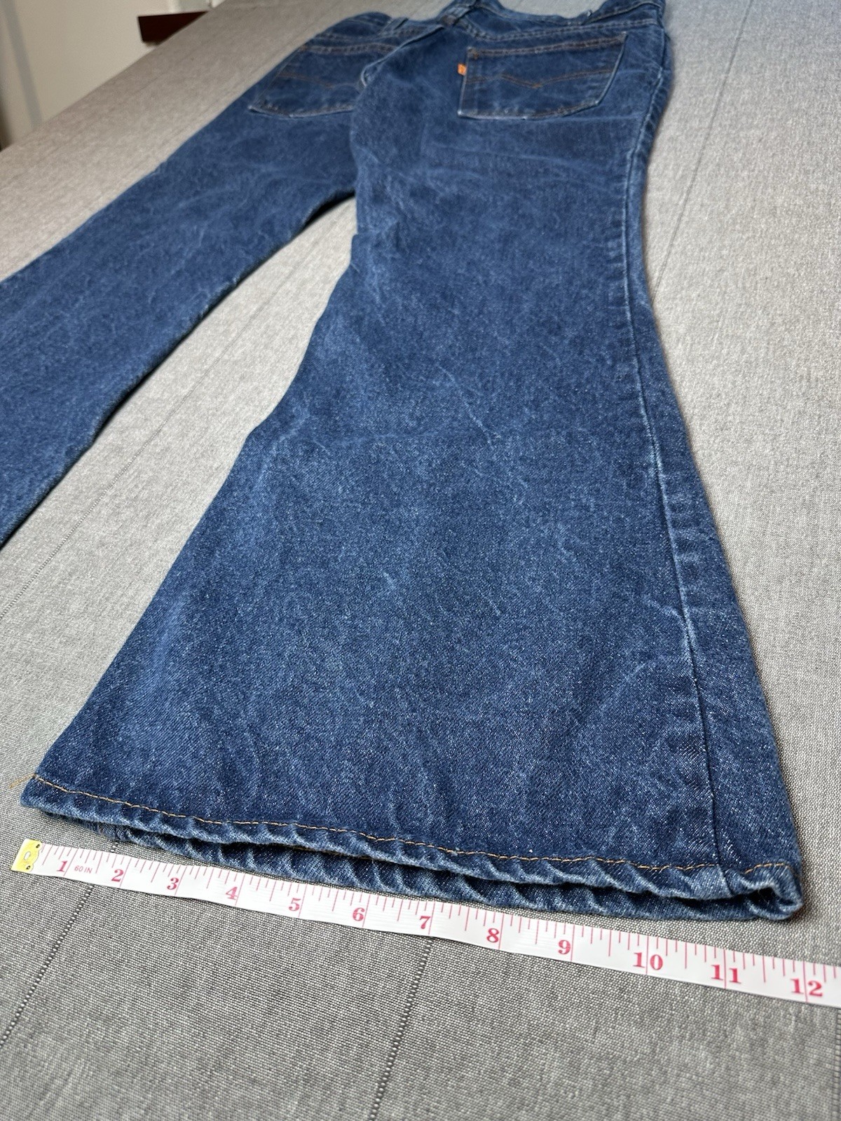 Vintage 1980s Orange Tab Bell Bottom Levis Women’s 32×28