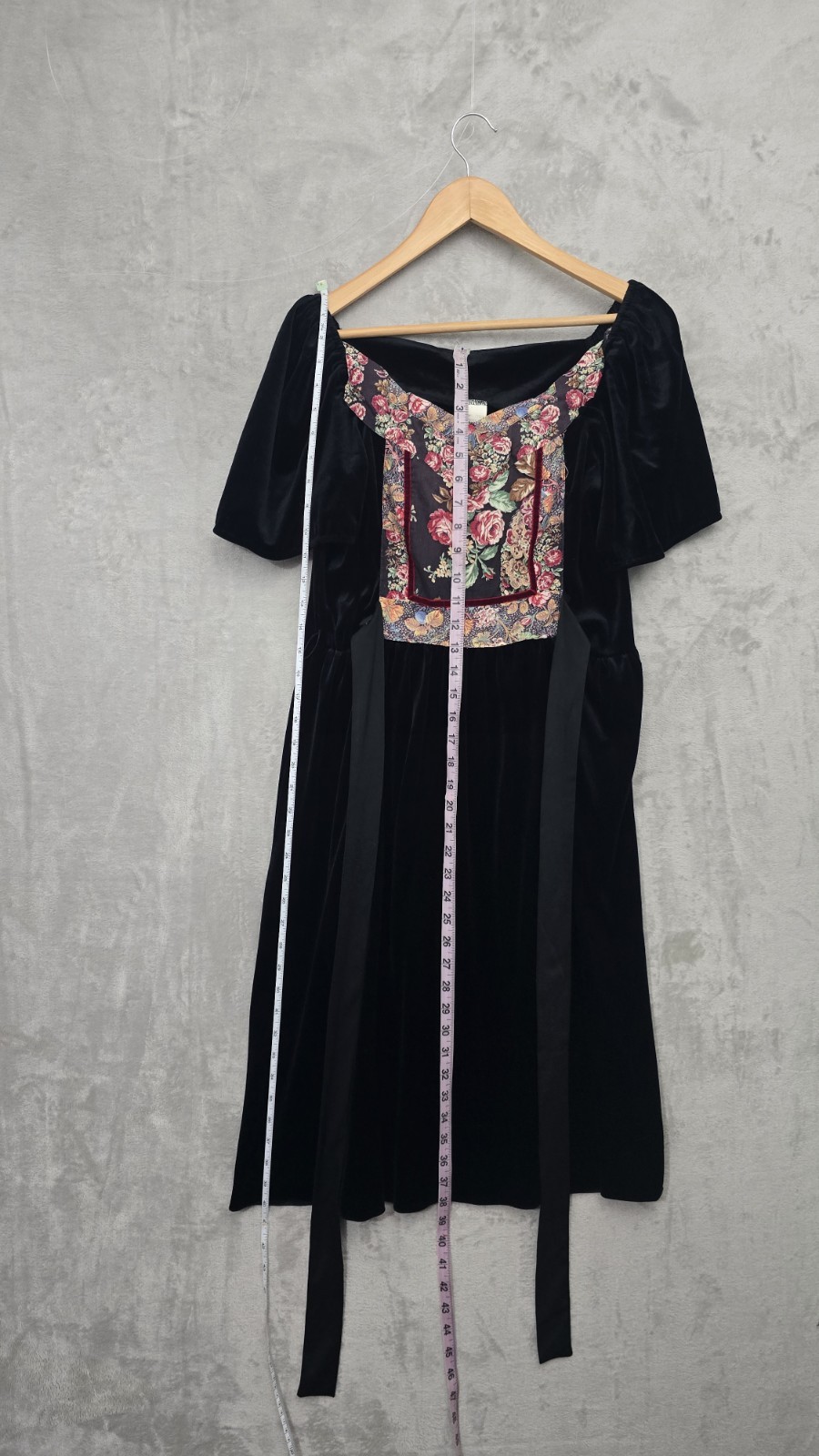 vintage 80s black velvet dirndl dress featuring a floral patterned bodice, Dress
