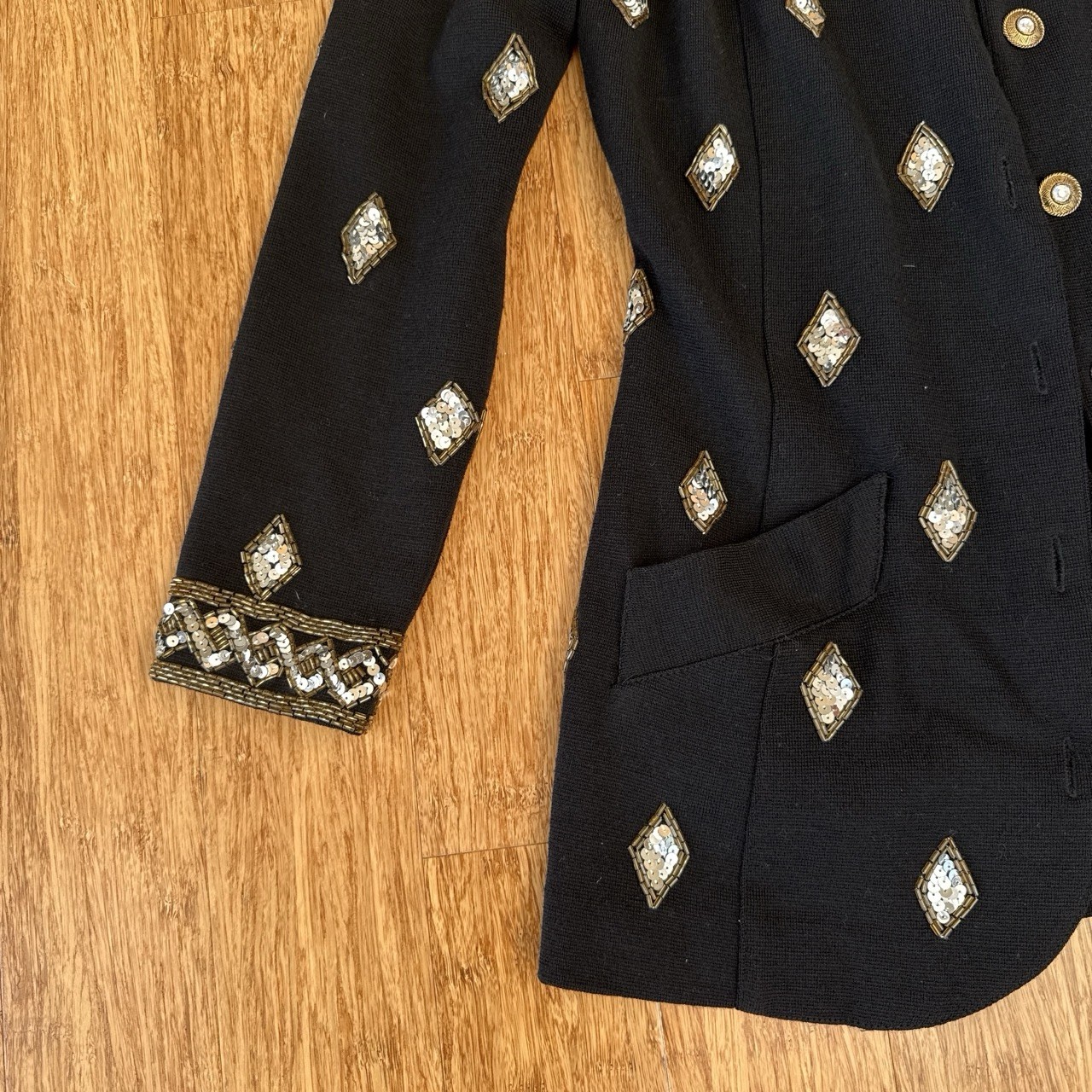 VNTG 1980s Adrianne Vittadini BLK blazer with sliver and gold embellishments.