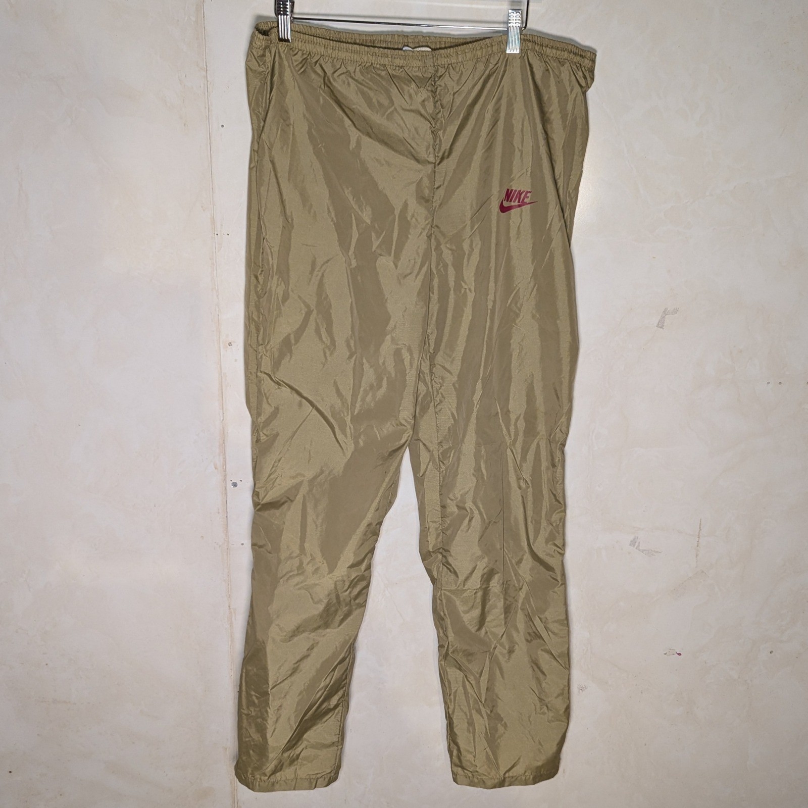 Vtg 1980s Nike women’s track pants gold large logo 38×32 drawstring running USA