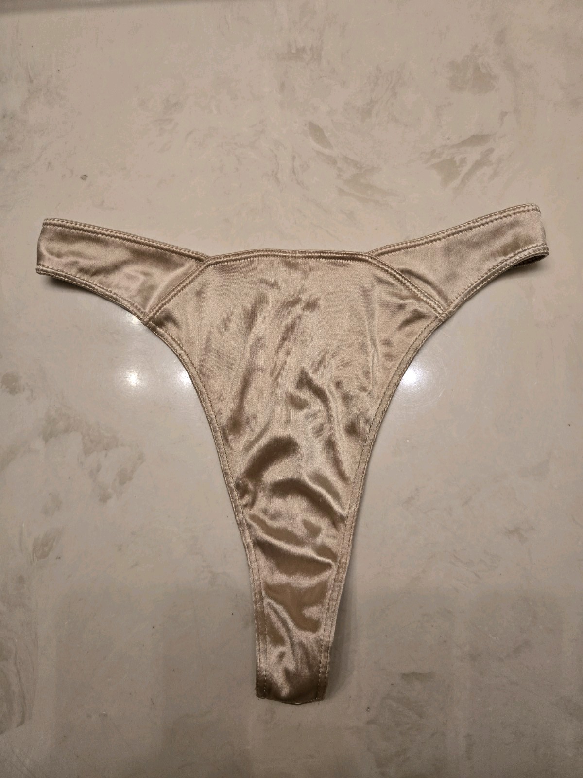 Vintage Victoria’s Secret Second Skin Satin Thong Gold Size Medium Read