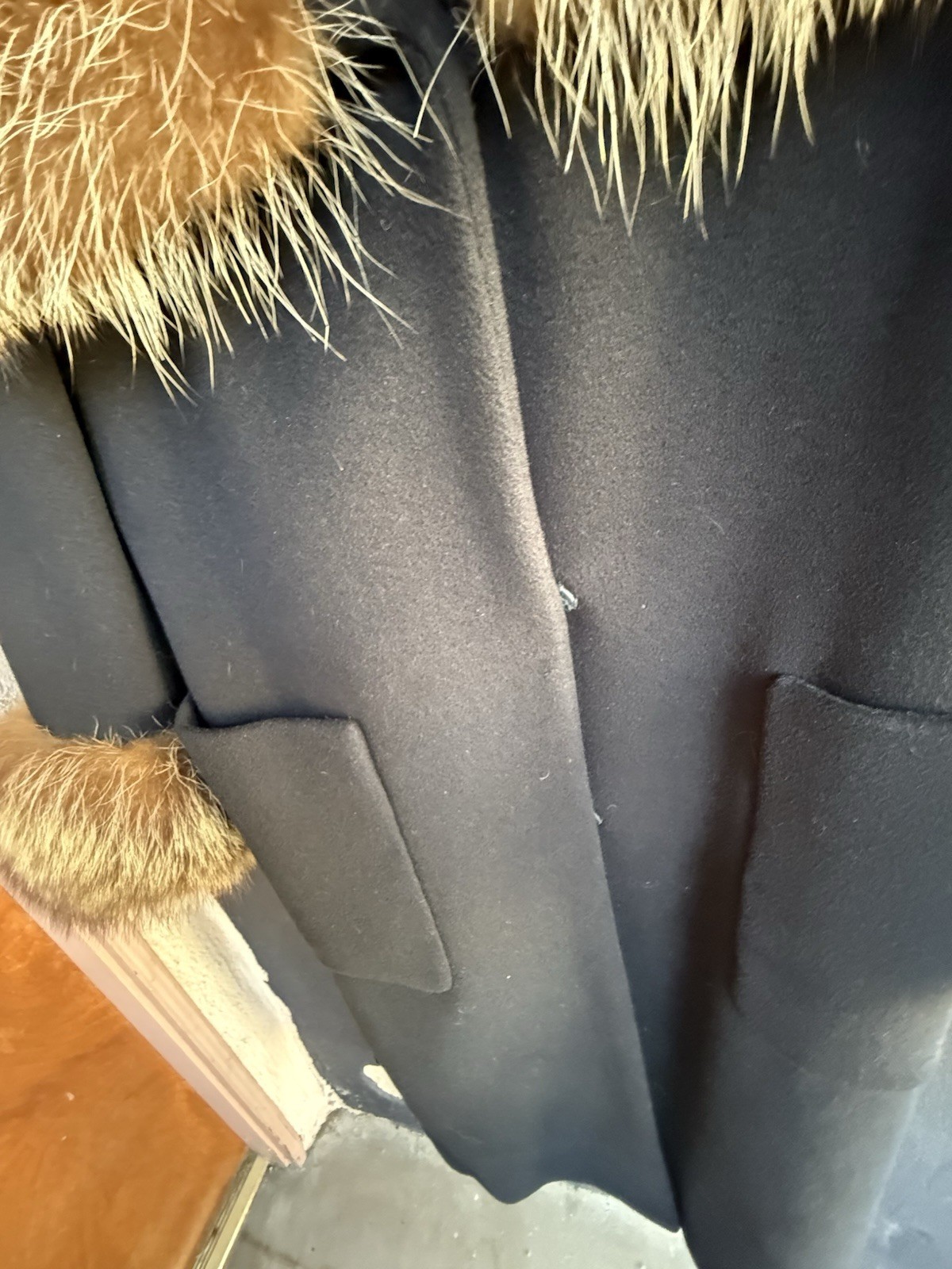 Absolutely Gorgeous Vintage black wool coat with Raccoon fur collar and wrists