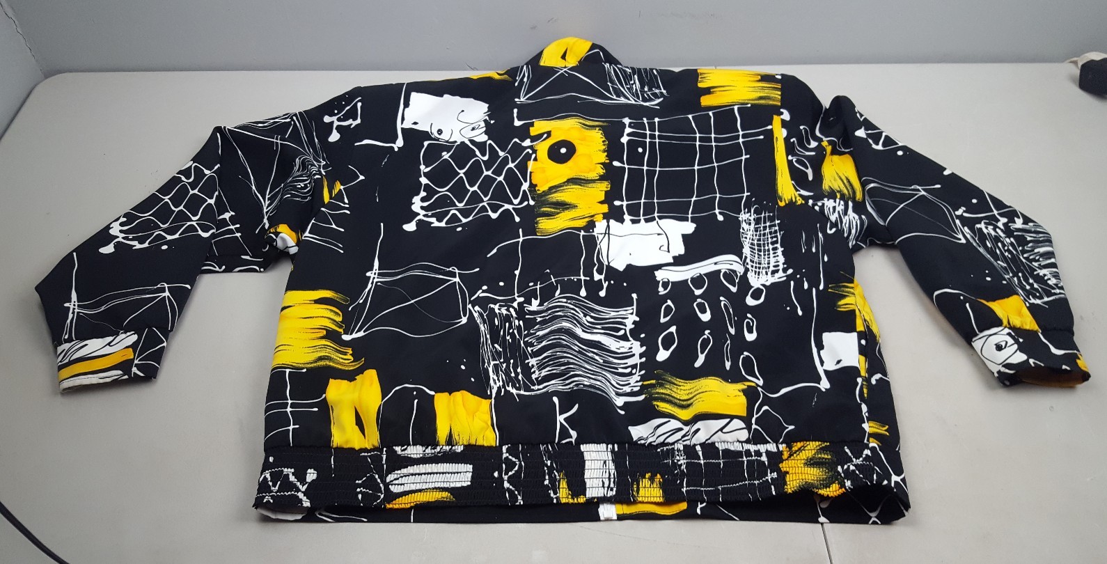 vintage 80s three flaggs black white and yellow jacket with padded shoulders xl